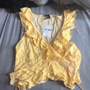 Yellow ruffle tie shirt!